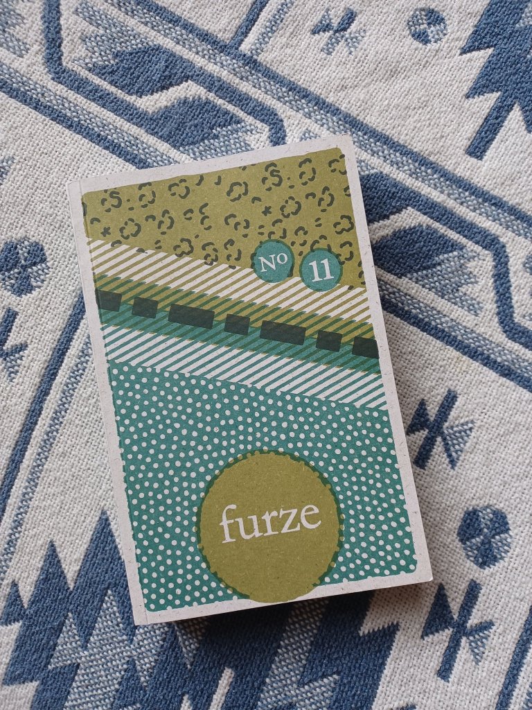 Image shows the journal issue on the 'furze' side, laid out on a blanket